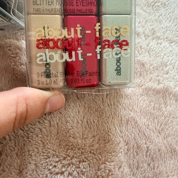 Lacoste Blue Pouch with About Face and NYX makeup products - Picture 3 of 6